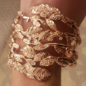 Rose gold color cuff with leaf design